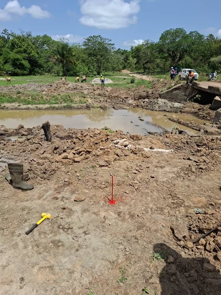 Engineers setting out a washed-out crossing