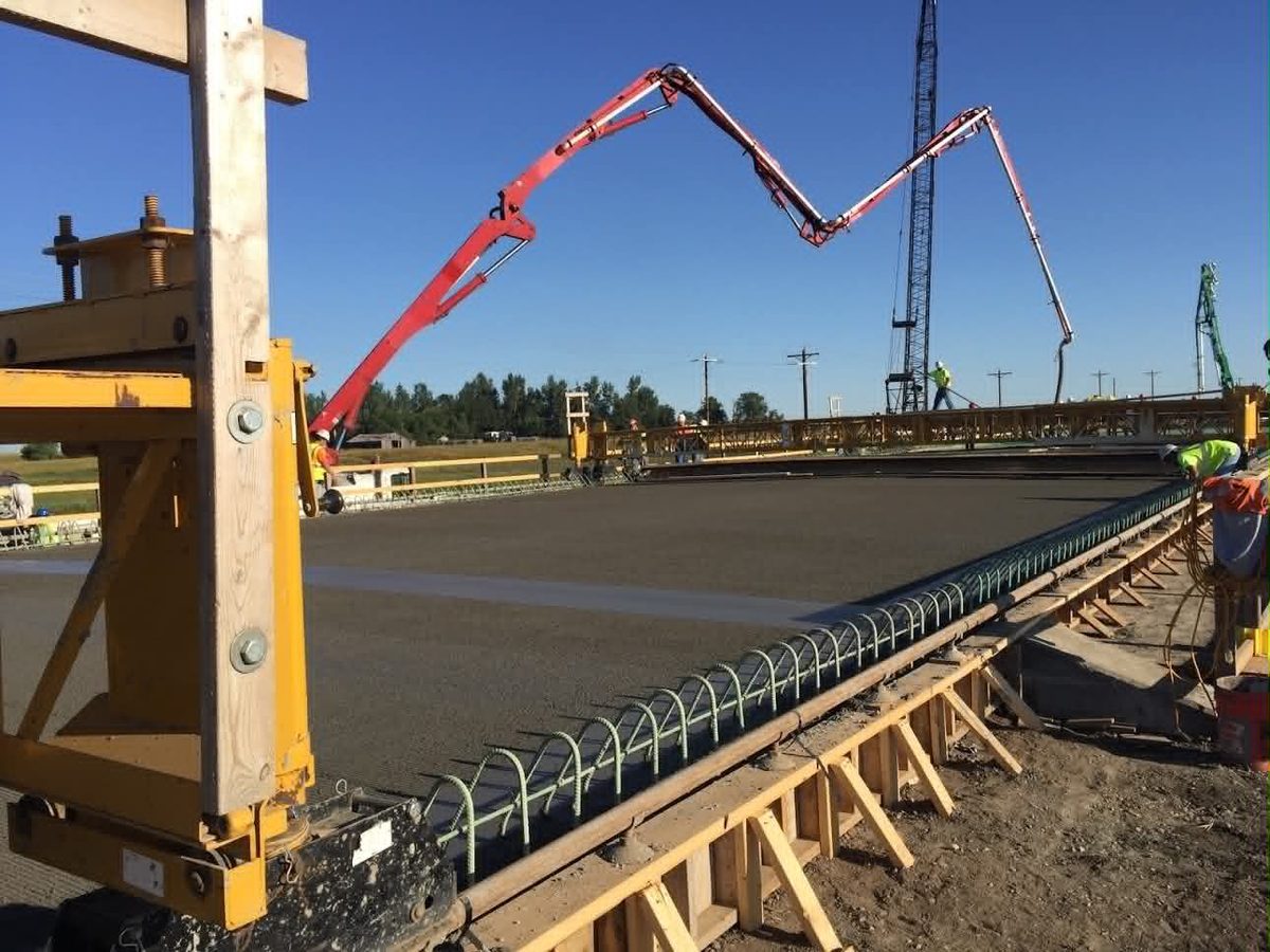 Concrete pump placing a bridge deck
